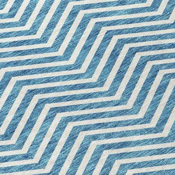 5' X 8' Teal Blue And Ivory Chevron Washable Indoor Outdoor Area Rug