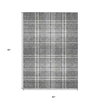 5' X 8' Gray Black And Ivory Plaid Washable Indoor Outdoor Area Rug
