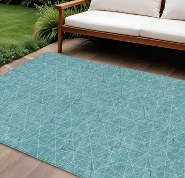 8' X 10' Teal Blue Black And Ivory Geometric Washable Indoor Outdoor Area Rug