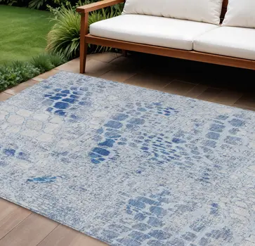 8' X 10' Sky Blue And Ivory Abstract Washable Indoor Outdoor Area Rug