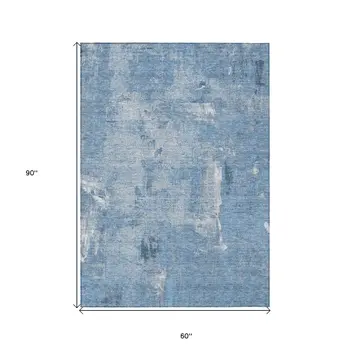 5' X 8' Denim Blue And Ivory Abstract Washable Indoor Outdoor Area Rug