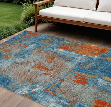 10' X 14' Navy Blue Orange And Ivory Abstract Washable Indoor Outdoor Area Rug