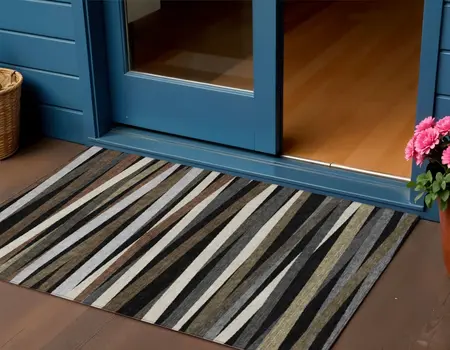 3' X 5' Black Brown And Ivory Striped Washable Indoor Outdoor Area Rug