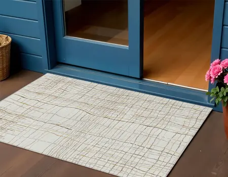 3' X 5' Ivory Brown And Gold Striped Washable Indoor Outdoor Area Rug