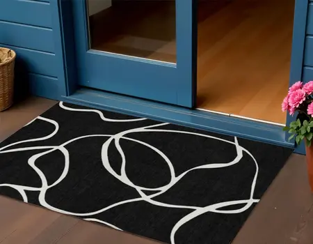 3' X 5' Black And Ivory Abstract Washable Indoor Outdoor Area Rug