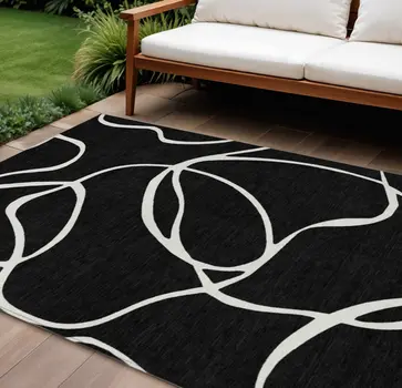 10' X 14' Black And Ivory Abstract Washable Indoor Outdoor Area Rug