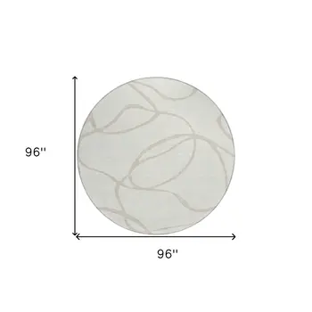 8' Ivory And Beige Round Abstract Washable Indoor Outdoor Area Rug
