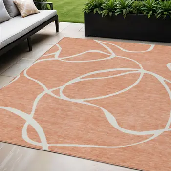 5' X 8' Salmon And Ivory Abstract Washable Indoor Outdoor Area Rug