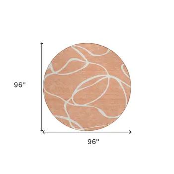 8' Salmon And Ivory Round Abstract Washable Indoor Outdoor Area Rug