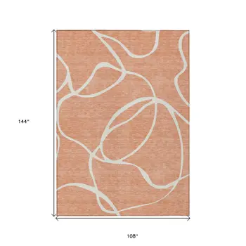 9' X 12' Salmon And Ivory Abstract Washable Indoor Outdoor Area Rug