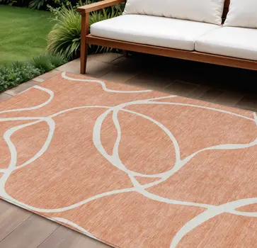 9' X 12' Salmon And Ivory Abstract Washable Indoor Outdoor Area Rug