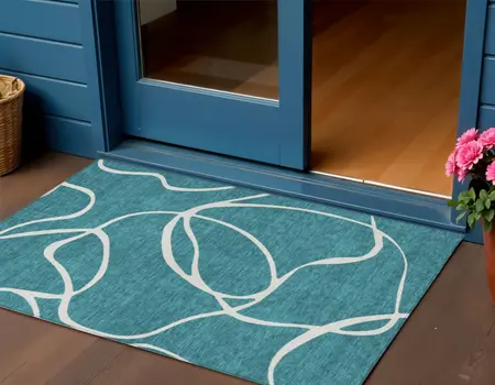 3' X 5' Teal Blue And Ivory Abstract Washable Indoor Outdoor Area Rug