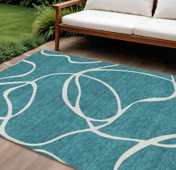 8' X 10' Teal Blue And Ivory Abstract Washable Indoor Outdoor Area Rug