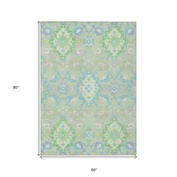 5' X 8' Mint Green Blue And Ivory Oriental Washable Indoor Outdoor Area Rug
