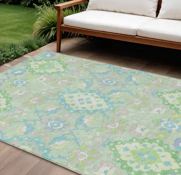 8' X 10' Mint Green Blue And Ivory Oriental Washable Indoor Outdoor Area Rug