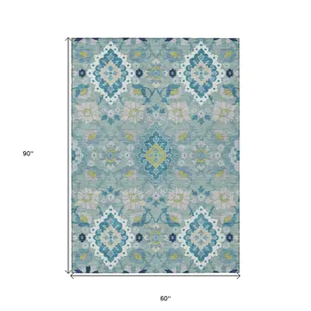 5' X 8' Teal Blue Green And Ivory Oriental Washable Indoor Outdoor Area Rug