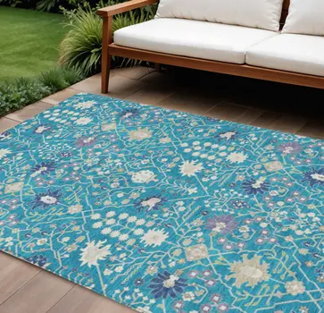 10' X 14' Teal Blue Purple And Ivory Oriental Washable Indoor Outdoor Area Rug