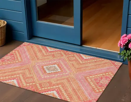 3' X 5' Coral Pink And Ivory Tribal Washable Indoor Outdoor Area Rug