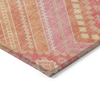 5' X 8' Coral Pink And Ivory Tribal Washable Indoor Outdoor Area Rug