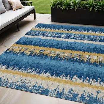 5' X 8' Navy Blue Gold And Ivory Striped Washable Indoor Outdoor Area Rug
