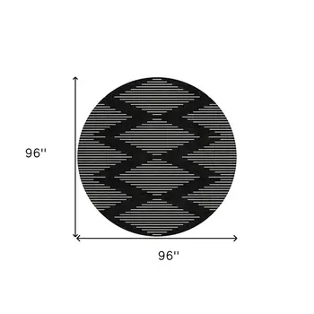 8' Black And Ivory Round Geometric Washable Indoor Outdoor Area Rug