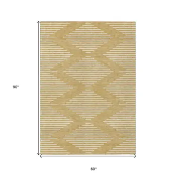 5' X 8' Gold And Ivory Geometric Washable Indoor Outdoor Area Rug