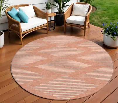 8' Salmon And Ivory Round Geometric Washable Indoor Outdoor Area Rug