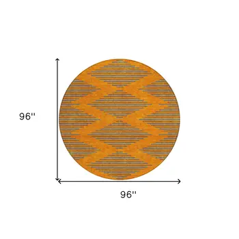 8' Orange And Blue Round Geometric Washable Indoor Outdoor Area Rug