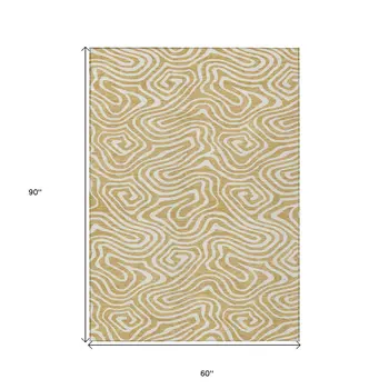 5' X 8' Gold And Beige Abstract Washable Indoor Outdoor Area Rug