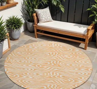 8' Peach And Ivory Round Abstract Washable Indoor Outdoor Area Rug