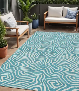 5' X 8' Teal Blue And Ivory Abstract Washable Indoor Outdoor Area Rug