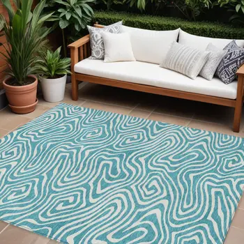 8' X 10' Teal Blue And Ivory Abstract Washable Indoor Outdoor Area Rug