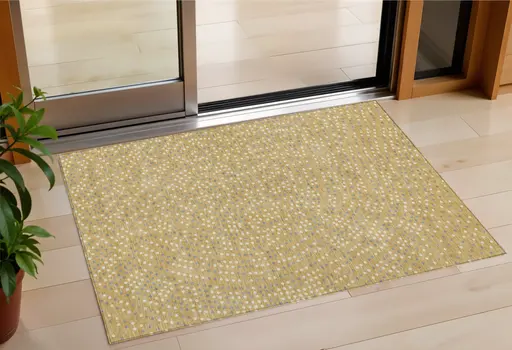 3' X 5' Gold Gray And Ivory Polka Dot Washable Indoor Outdoor Area Rug