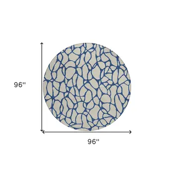 8' Beige And Blue Round Geometric Washable Indoor Outdoor Area Rug