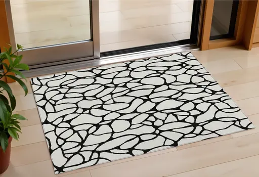 3' X 5' Ivory And Black Geometric Washable Indoor Outdoor Area Rug