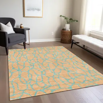 5' X 8' Mint Green And Peach Geometric Washable Indoor Outdoor Area Rug