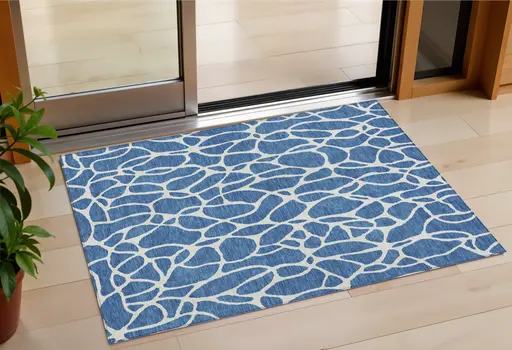 3' X 5' Blue And Ivory Geometric Washable Indoor Outdoor Area Rug