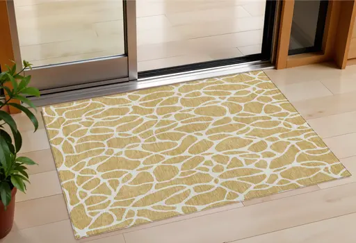 3' X 5' Gold And Ivory Geometric Washable Indoor Outdoor Area Rug