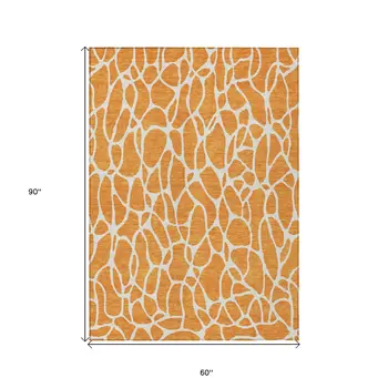 5' X 8' Orange And Ivory Geometric Washable Indoor Outdoor Area Rug