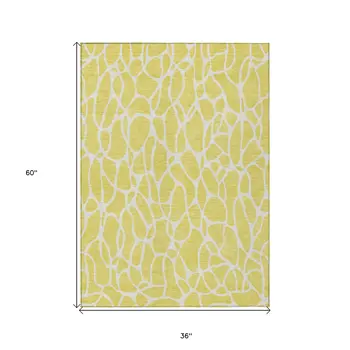3' X 5' Yellow And Ivory Geometric Washable Indoor Outdoor Area Rug