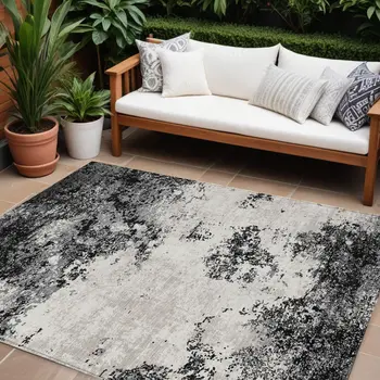 10' X 14' Black Gray And Ivory Abstract Washable Indoor Outdoor Area Rug