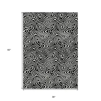 3' X 5' Black And Ivory Abstract Washable Indoor Outdoor Area Rug