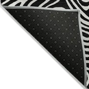 10' X 14' Black And Ivory Abstract Washable Indoor Outdoor Area Rug