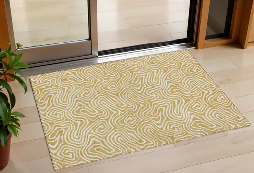 3' X 5' Gold And Ivory Abstract Washable Indoor Outdoor Area Rug