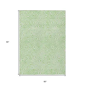 5' X 8' Mint Green And Ivory Abstract Washable Indoor Outdoor Area Rug