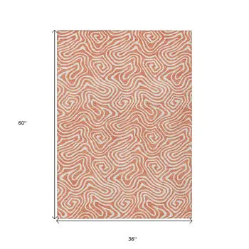 3' X 5' Salmon And Ivory Abstract Washable Indoor Outdoor Area Rug