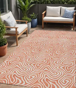 5' X 8' Salmon And Ivory Abstract Washable Indoor Outdoor Area Rug