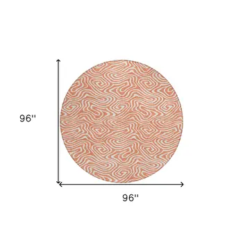 8' Salmon And Ivory Round Abstract Washable Indoor Outdoor Area Rug