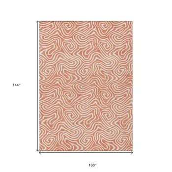 9' X 12' Salmon And Ivory Abstract Washable Indoor Outdoor Area Rug