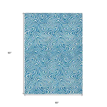 5' X 8' Teal Blue And Ivory Abstract Washable Indoor Outdoor Area Rug